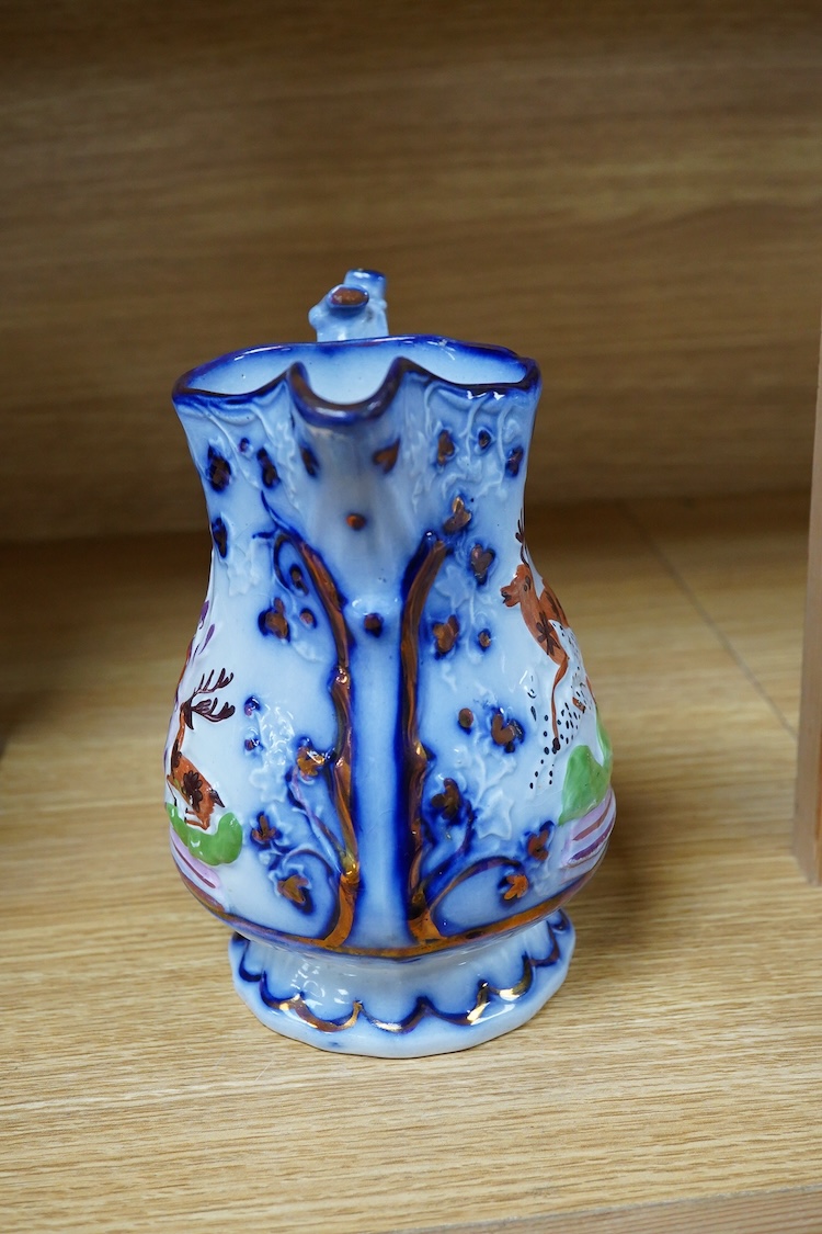 A Beswick model of an elephant and a Staffordshire jug, c.1840, largest 34cm wide